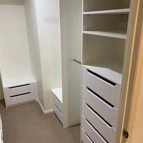 Custom walk-in robe with drawers