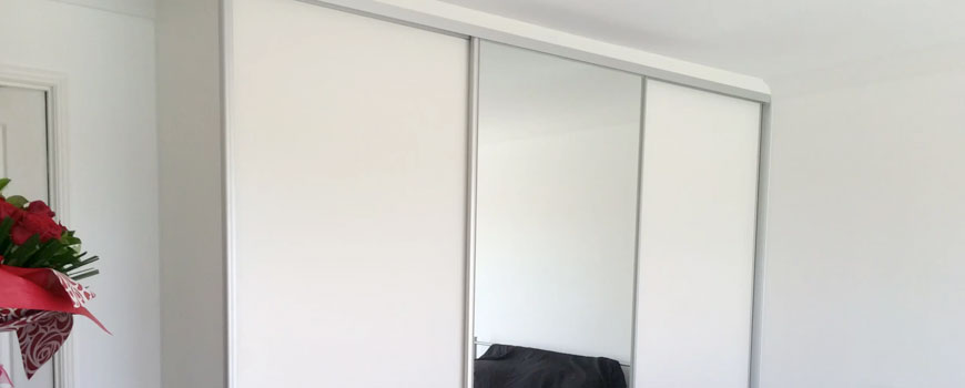 Bedroom wardrobe with mirror doors