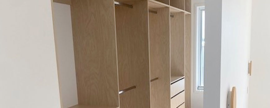 Walk-in robe with timber finish